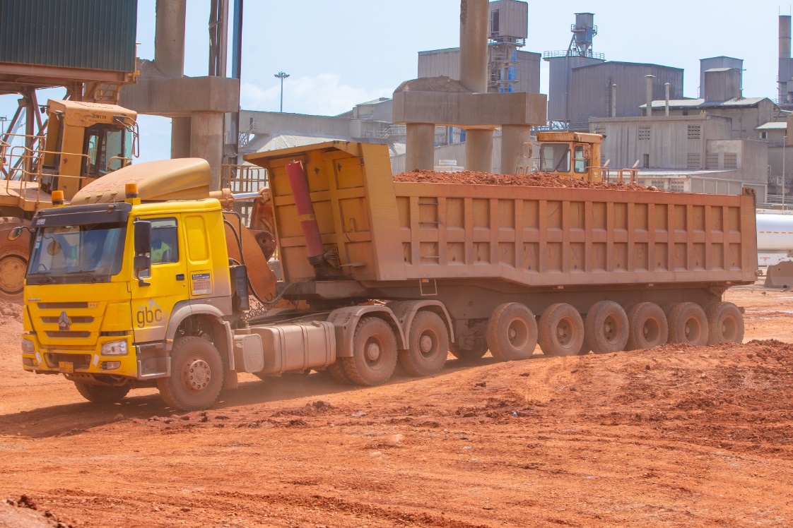 GBC tipper truck hauling bauxite at the processing area