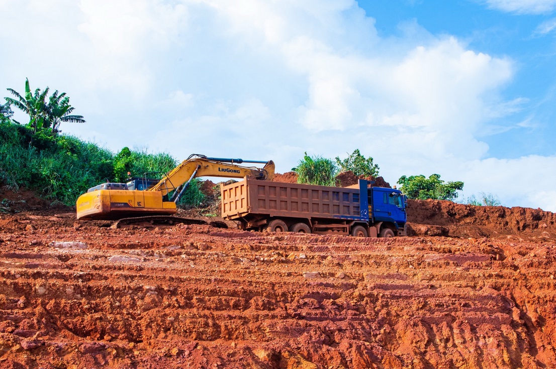 Excavator loading a tipper truck