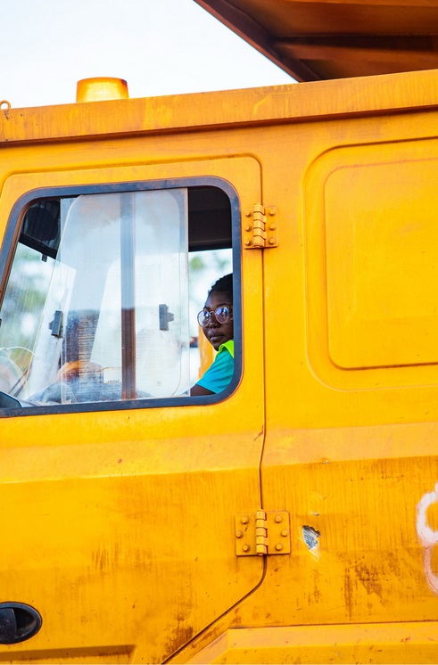 Equipment operator looking out of the cab